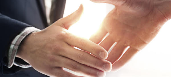 Enteris BioPharma picture showing two hands reaching out for a handshake. 